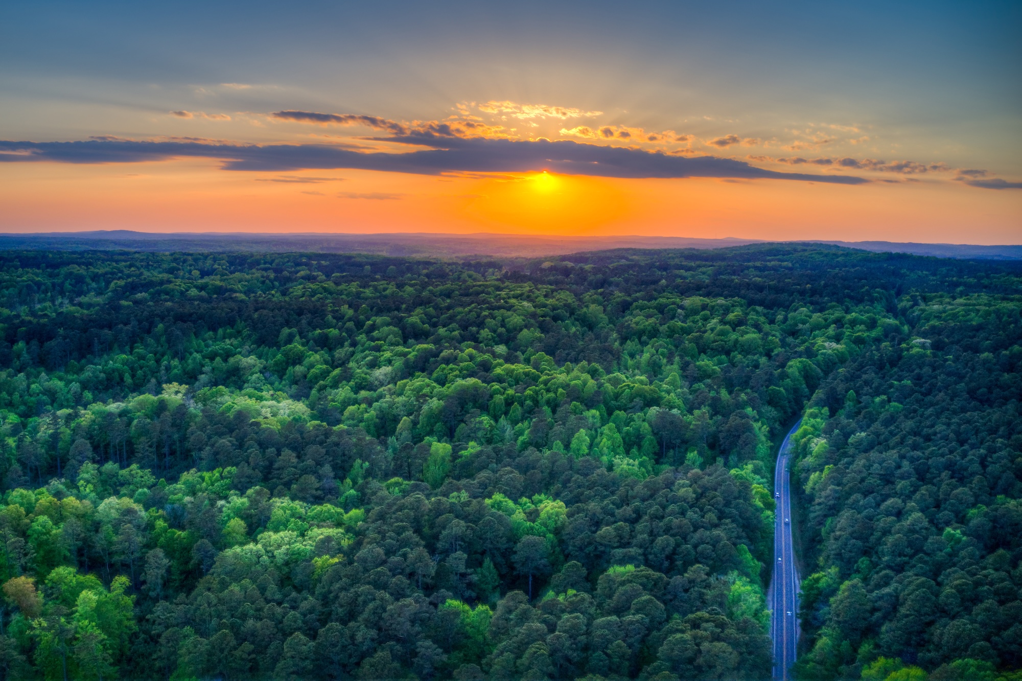 Sunset over the Durham Division of Duke Forest, with NC-751 below. Near gate 4.